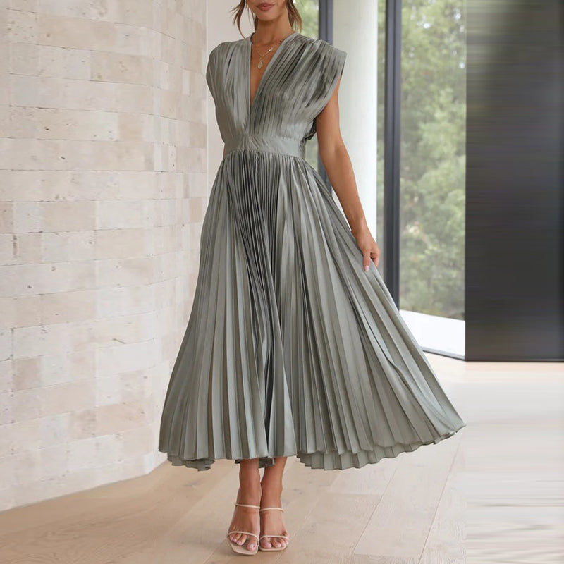 Rosie - Flowy Women's Wedding Guest Dress with Deep V-Neck and Pleated Midi Skirt
